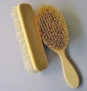 antique faux-ivory celluloid brushes