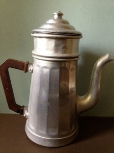 antique coffee pot with a bakelite handle
