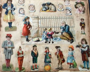 1800s album page with various die cut scraps pasted on.