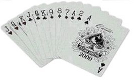 Though the overlapping prevents us from knowing, most will assume the above picture shows whole playing cards. I assume the cards are rectangular and whole.